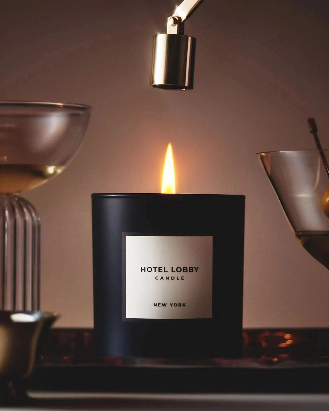 Hotel Lobby Candle with a label on a dark background