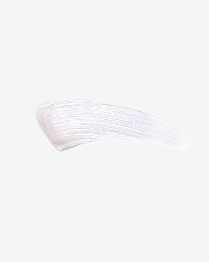 White brow gel on a light pink background