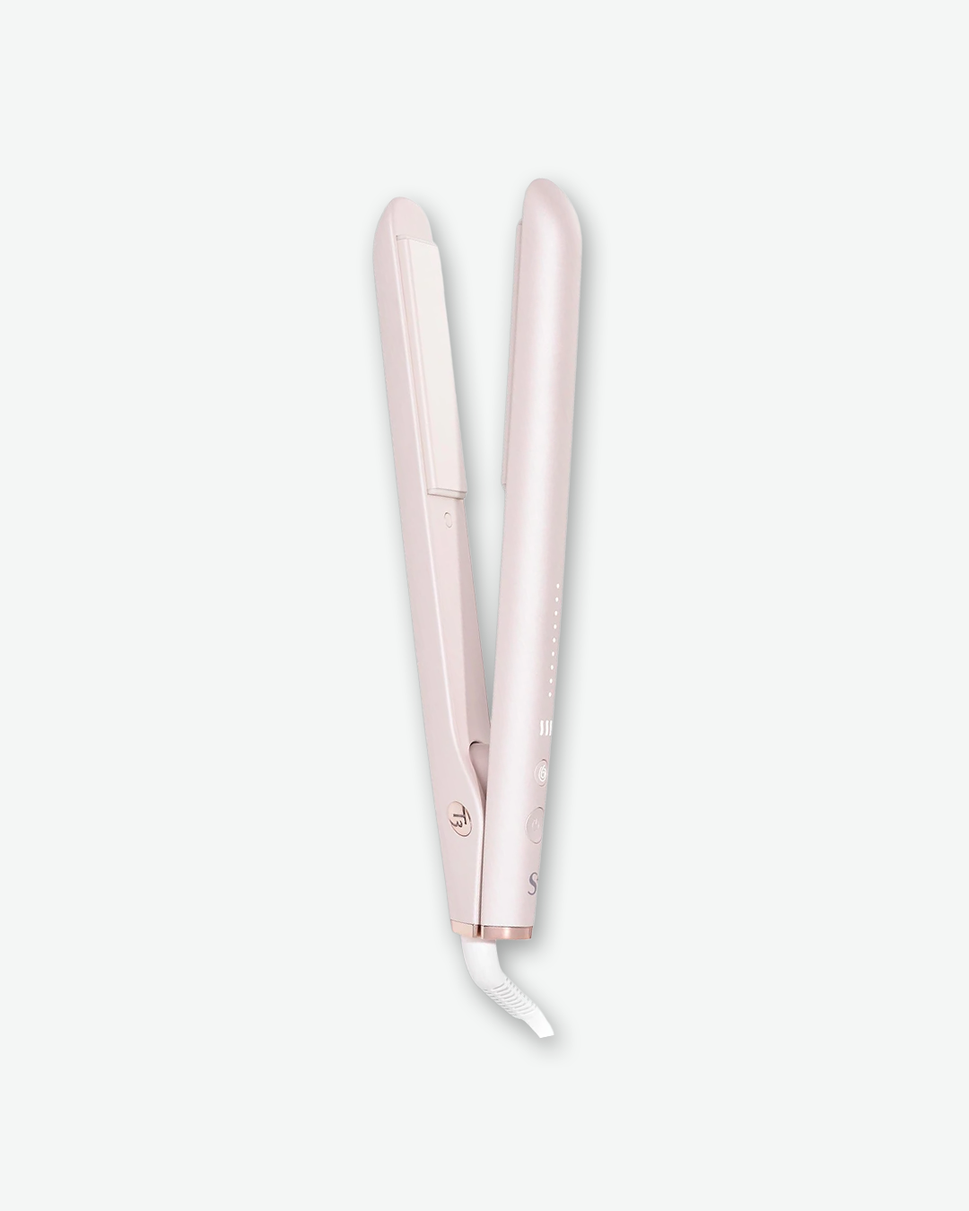 A product shot of a T3 hair straightener flat iron, centered vertically at a slight angle against a plain light gray background. The styling tool is finished in a satin light pink color with subtle rose-gold accents around the joints and base. The iron is shown slightly open, revealing its white ceramic heating plates, and features a white power cord base protruding from the bottom.