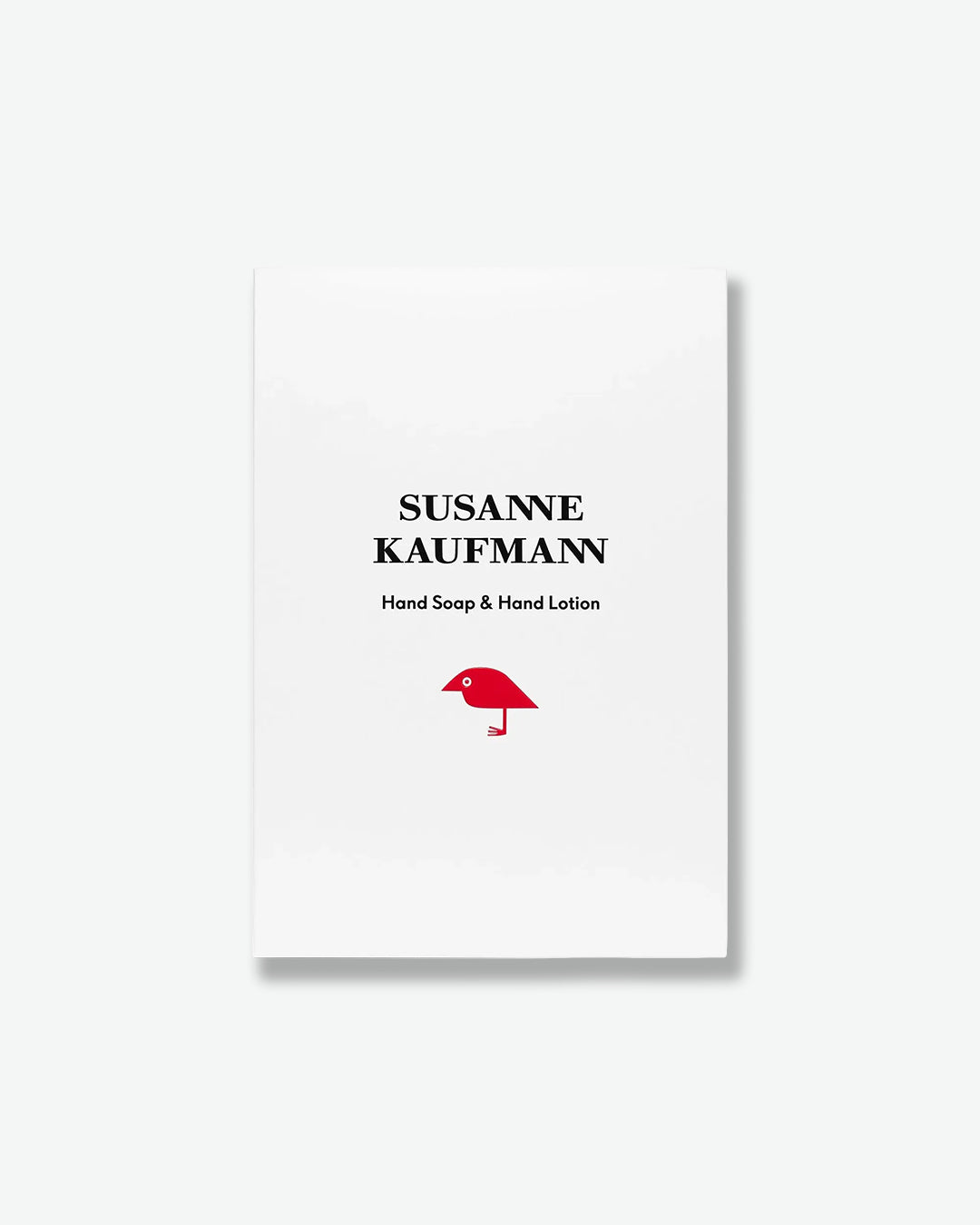 Product packaging for Susanne Kaufmann hand soap and hand lotion with a red bird logo on a white background.