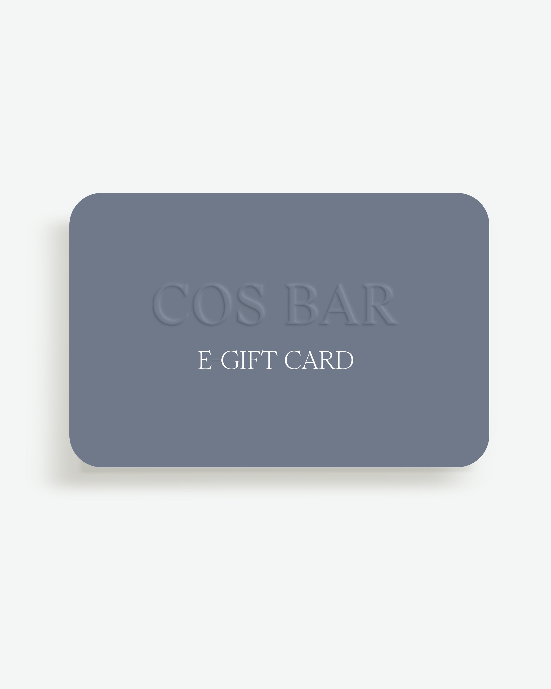 A rectangular, slate blue Cos Bar E-Gift Card with rounded corners against a light background. The words "COS BAR" are embossed in the center, with "E-GIFT CARD" written in white serif font underneath.
